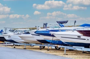 A row of new boats ready to go at a marine dealership