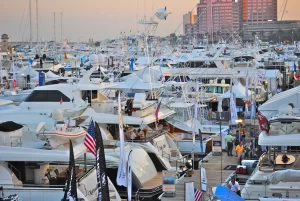 A crowded wharf full of new boats at a boat show