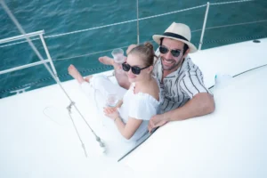 A couple relaxing on their boat after purchasing at the Sanctuary Cove Boat Show in 2025.